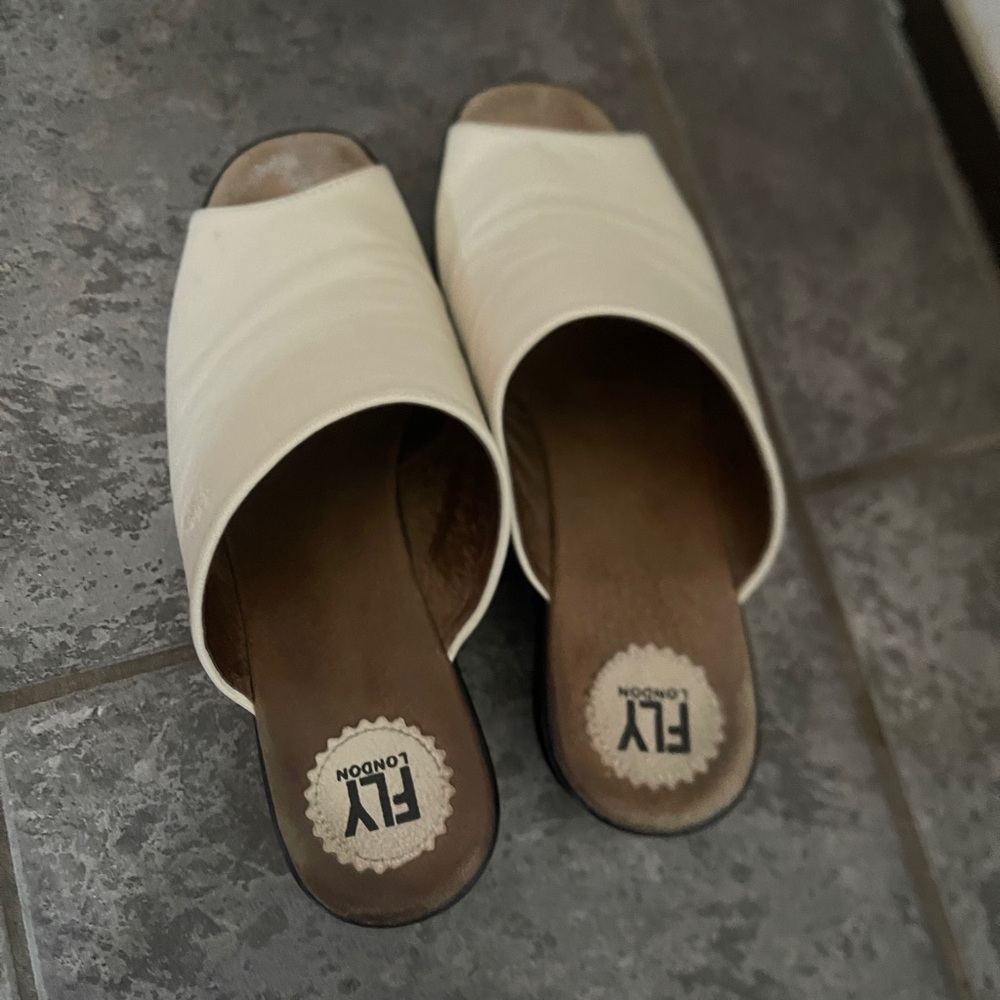 Fly London slides with 2 inch wedge heel
